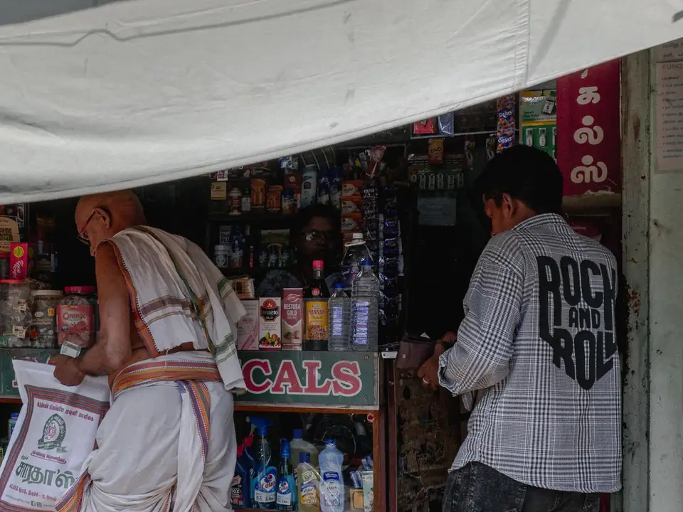 Customers at a small neighbourhood shop in Tamil Nadu, the kind of local business a Coimbatore Google Ads campaign is set up for